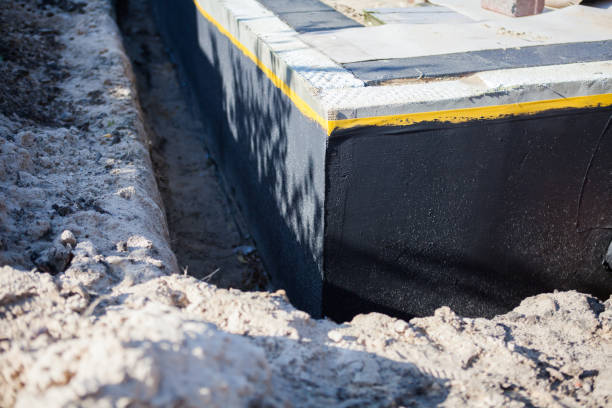 Professional Emergency Waterproofing technician working in Glyndon, MD